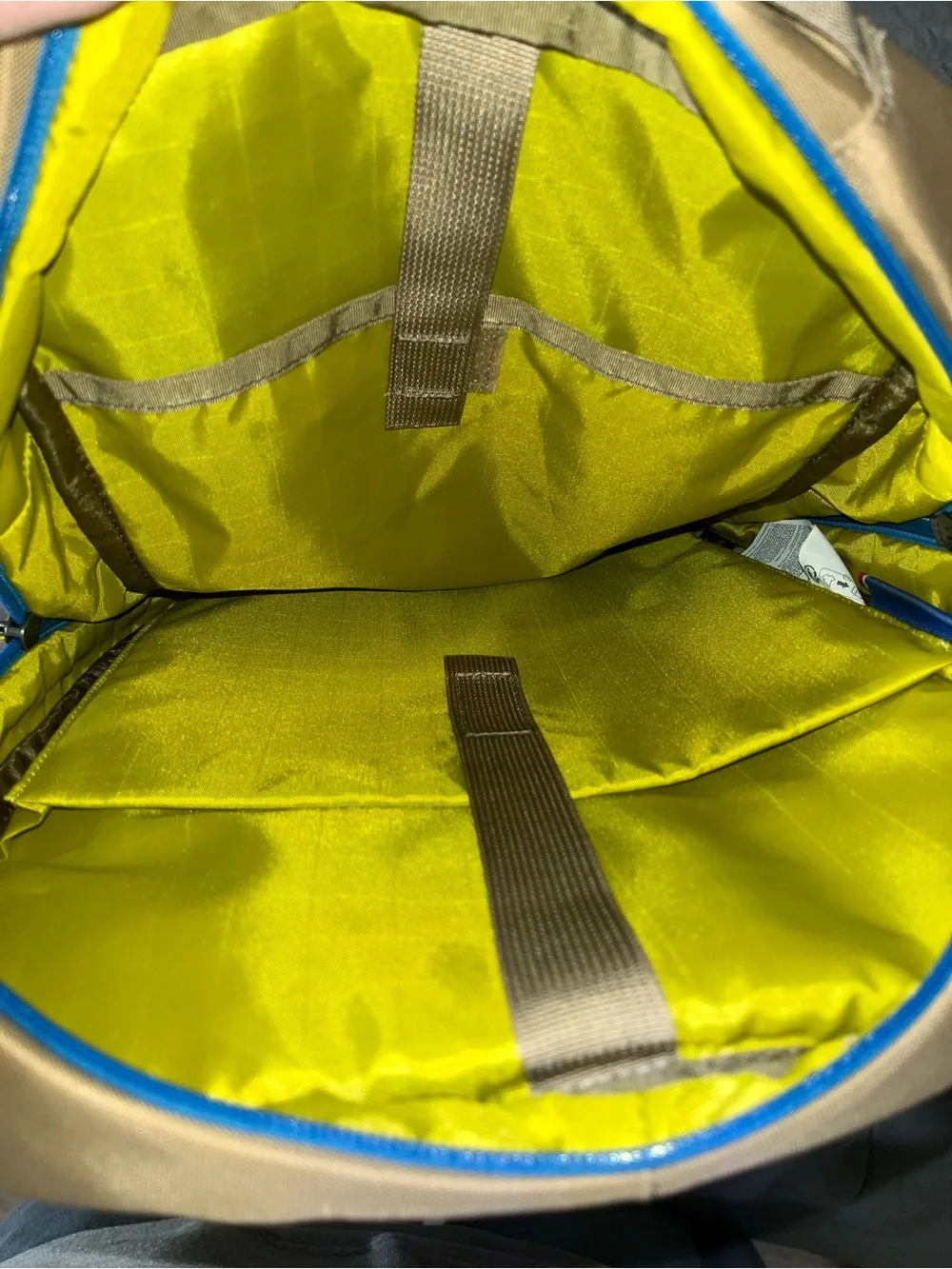 cotopaxi Tan Backpack with Blue Zipper and Multicolor Pulls